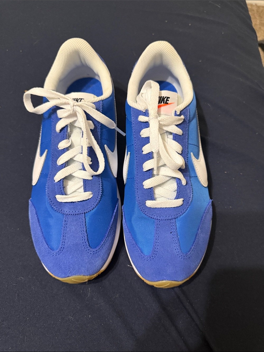 Nike women’s Blue and White Low-Top Sneakers retro suede and cloth. Lk new, 9.5